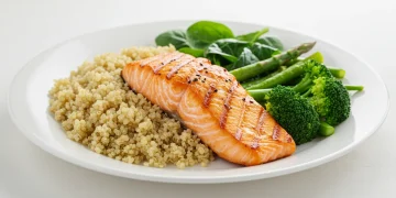 Balanced meal for type 2 diabetes management with salmon, quinoa, and vegetables.